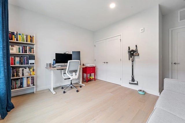 7 Lisbon St Unit 201, Boston, MA 02128 - office area featuring wood finished floors and baseboards