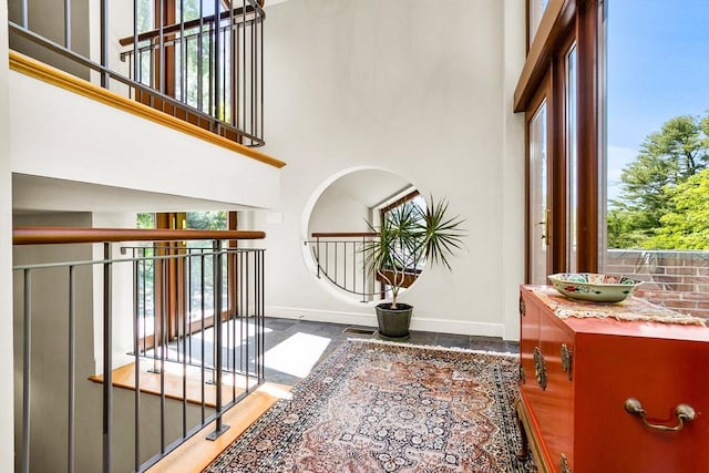 34 Lagrange St, Brookline, MA 02467 - corridor with baseboards and a towering ceiling