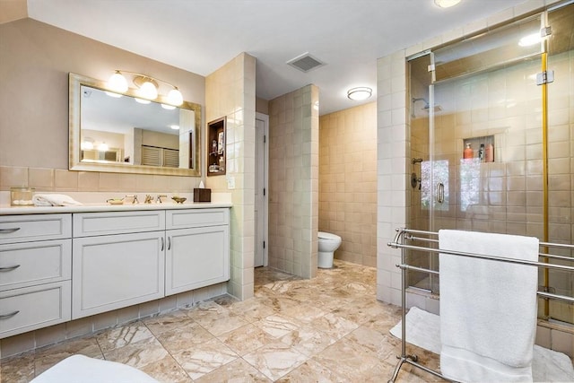 34 Lagrange St, Brookline, MA 02467 - full bathroom with tile walls, vanity, and a stall shower