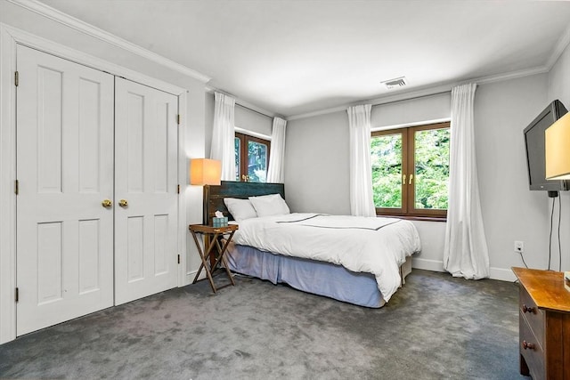 34 Lagrange St, Brookline, MA 02467 - carpeted bedroom featuring multiple windows and ornamental molding