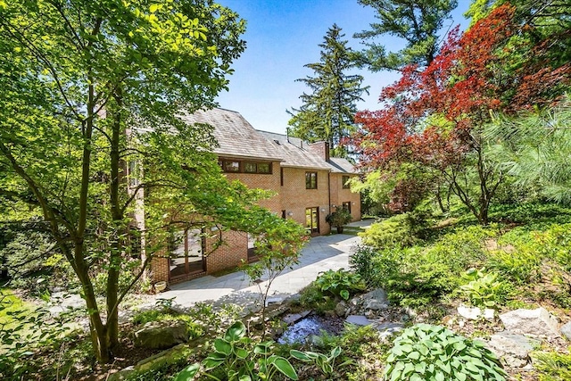34 Lagrange St, Brookline, MA 02467 - view of yard featuring a patio and french doors