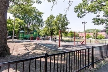 view of property's community with a playground