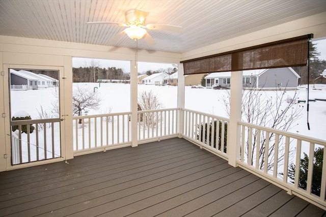 snow covered deck with ceiling fan