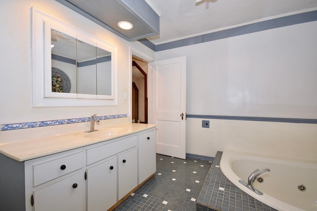 bathroom featuring vanity, crown molding, tiled tub, and tile patterned flooring