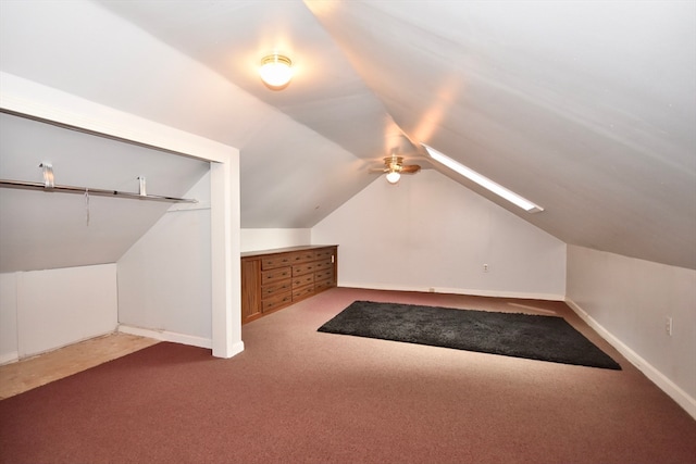 bonus room with lofted ceiling, carpet, and ceiling fan