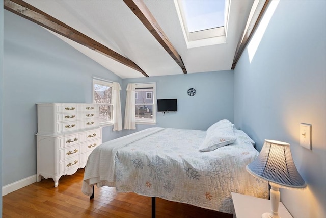 10 Chadwell Ave, Sandwich, MA 02563 - bedroom with baseboards, wood finished floors, and lofted ceiling with skylight