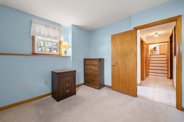 carpeted bedroom with baseboards