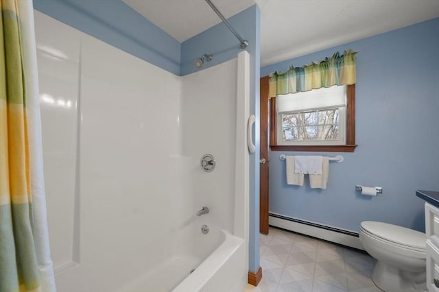 full bathroom with toilet, vanity, baseboard heating, tub / shower combination, and tile patterned floors