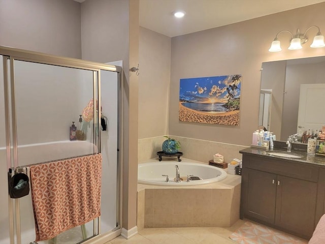 422 John Mahar Hwy Unit 305, Braintree, MA 02184 - bathroom with a bath, a shower stall, vanity, and tile patterned floors