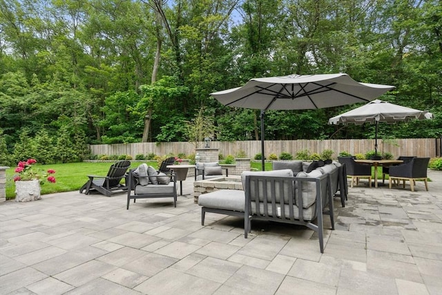 35 E St, Middleton, MA 01949 - fenced backyard featuring a patio, an outdoor living space, and outdoor dining area