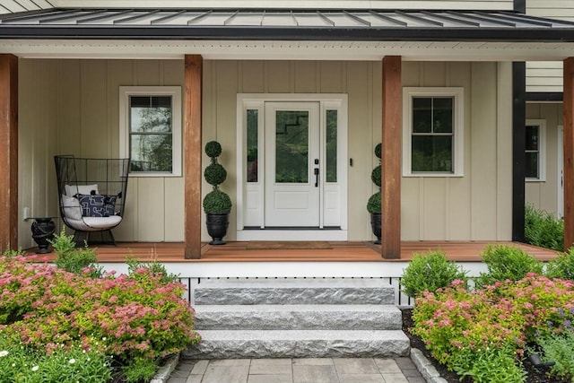 35 E St, Middleton, MA 01949 - view of exterior entry with a standing seam roof, a metal roof, and covered porch