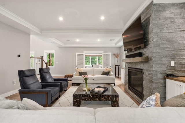 35 E St, Middleton, MA 01949 - living area with crown molding, a fireplace, light wood-style floors, plenty of natural light, and recessed lighting