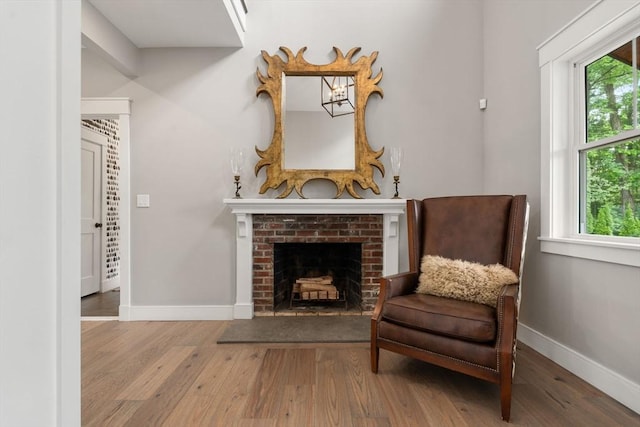 35 E St, Middleton, MA 01949 - sitting room with wood finished floors and a fireplace