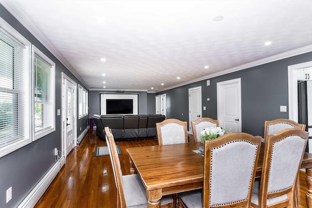 dining room featuring baseboards, a baseboard radiator, ornamental molding, hardwood / wood-style floors, and recessed lighting