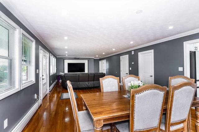 dining space with crown molding, dark wood-type flooring, and baseboard heating