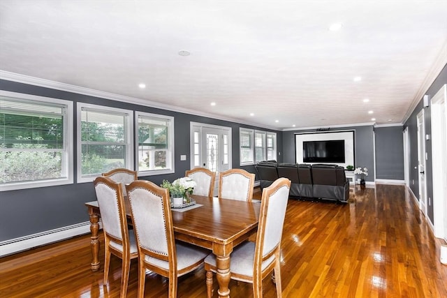 dining space featuring dark wood-style flooring, crown molding, recessed lighting, a baseboard radiator, and baseboards