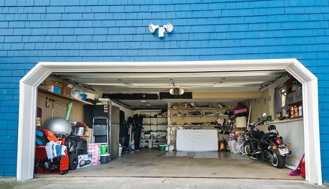 garage featuring a garage door opener