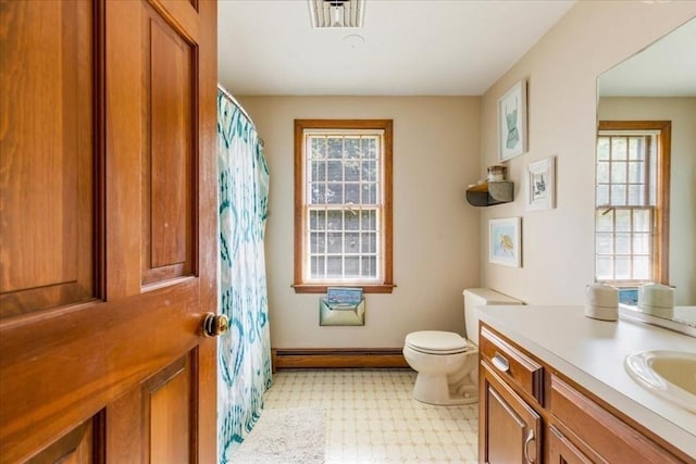 11 Tara Dr, Pembroke, MA 02359 - bathroom featuring baseboard heating, vanity, tile patterned floors, and curtained shower