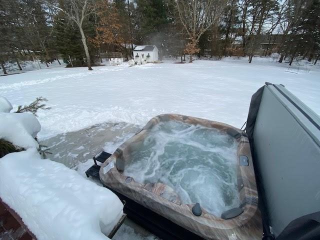 11 Tara Dr, Pembroke, MA 02359 - exterior view of a hot tub
