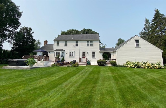 11 Tara Dr, Pembroke, MA 02359 - rear view of property with a hot tub, a yard, and a deck