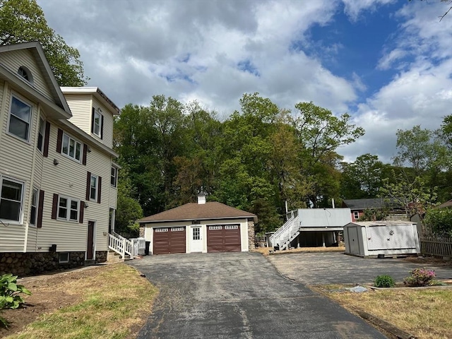 318 Holden St, Holden, MA 01520 - view of asphalt driveway with stairs