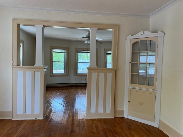 318 Holden St, Holden, MA 01520 - unfurnished room featuring decorative columns, crown molding, wood-type flooring, a baseboard heating unit, and a ceiling fan