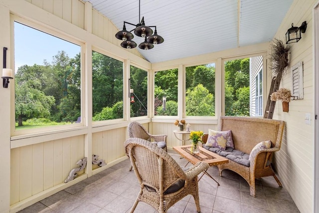 67 Hillside St, Rowley, MA 01969 - sunroom / solarium featuring lofted ceiling, healthy amount of natural light, and a chandelier