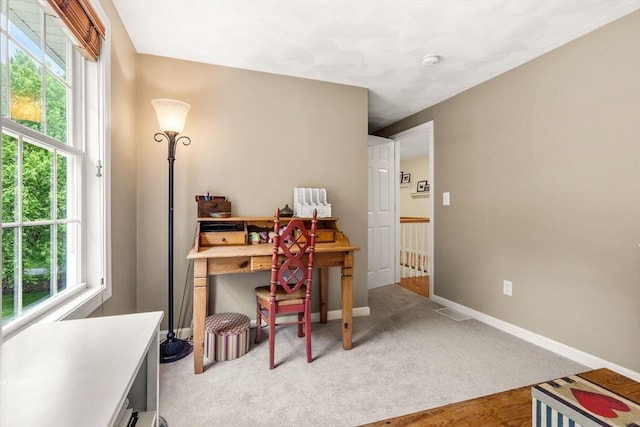 67 Hillside St, Rowley, MA 01969 - office area featuring plenty of natural light, baseboards, and light carpet
