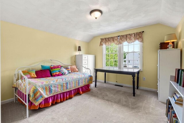 67 Hillside St, Rowley, MA 01969 - carpeted bedroom with vaulted ceiling and baseboards