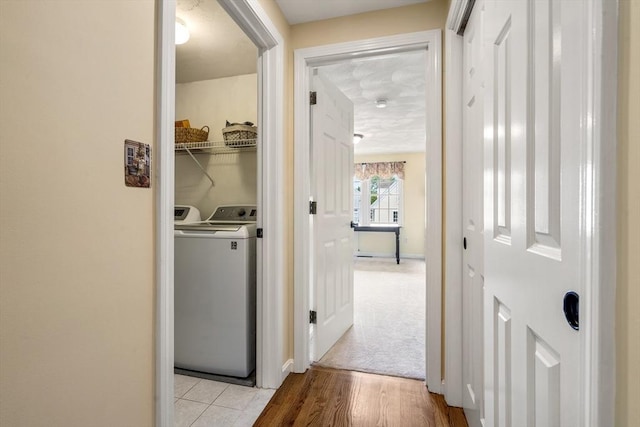 67 Hillside St, Rowley, MA 01969 - washroom featuring washer and dryer, wood finished floors, and baseboards