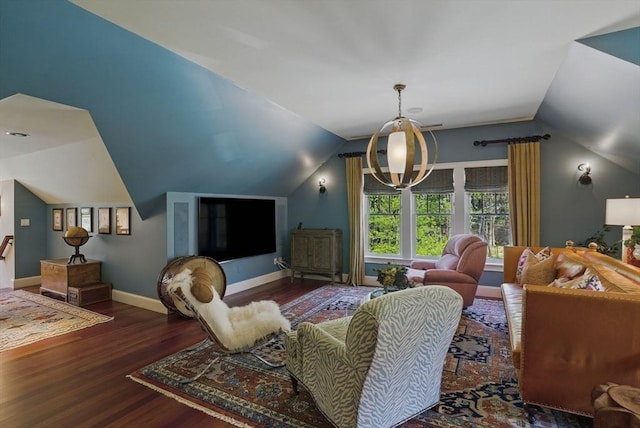 living area with wood finished floors, baseboards, and lofted ceiling