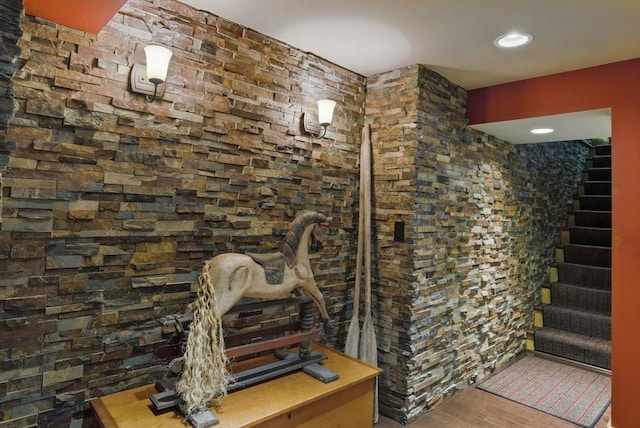 interior space featuring stairs and wood finished floors