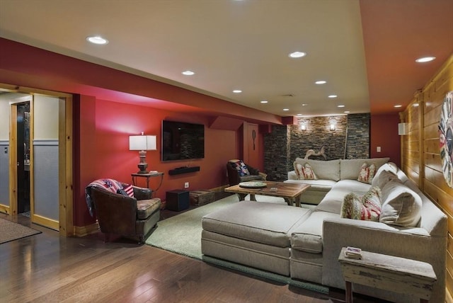 living area with recessed lighting and wood finished floors