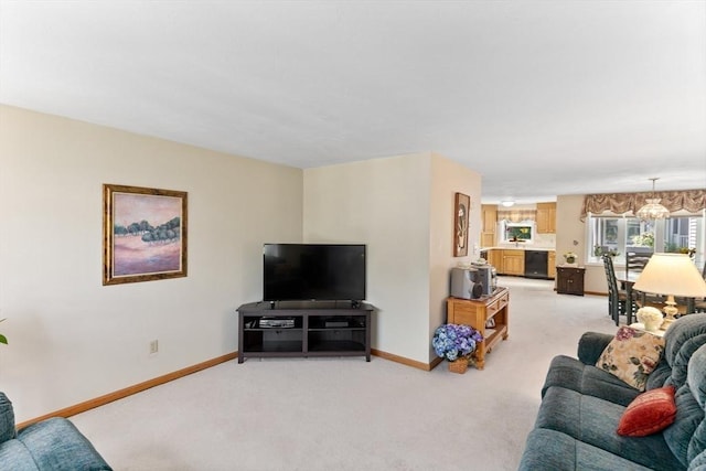 23 Indian Cove Way Unit 23, Easton, MA 02375 - living area with a chandelier and light colored carpet