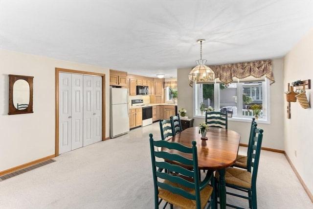 23 Indian Cove Way Unit 23, Easton, MA 02375 - dining space with light carpet and a chandelier