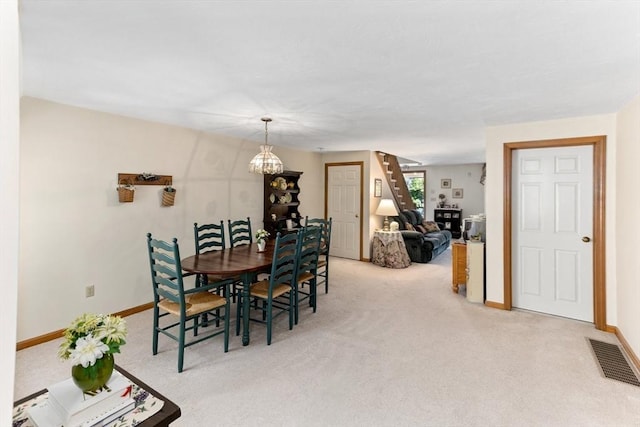 23 Indian Cove Way Unit 23, Easton, MA 02375 - dining area featuring light colored carpet and a chandelier
