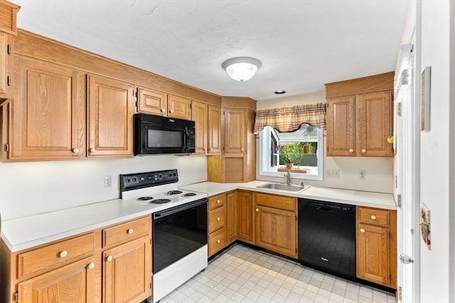 23 Indian Cove Way Unit 23, Easton, MA 02375 - kitchen with black appliances and light countertops