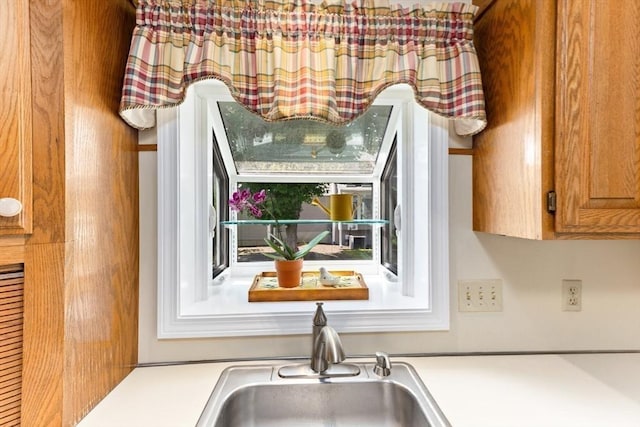 23 Indian Cove Way Unit 23, Easton, MA 02375 - kitchen featuring light countertops and brown cabinets