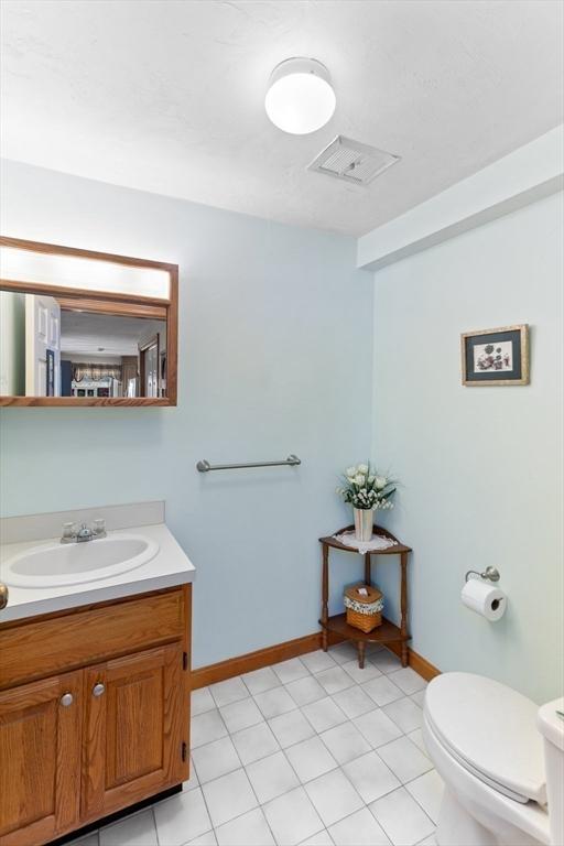 23 Indian Cove Way Unit 23, Easton, MA 02375 - bathroom featuring toilet and vanity