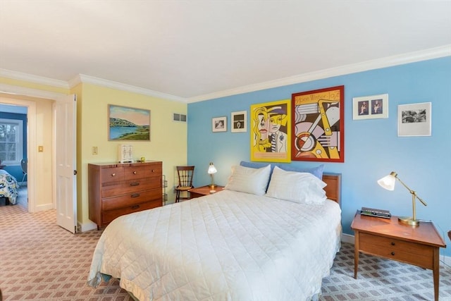 bedroom with crown molding and carpet flooring