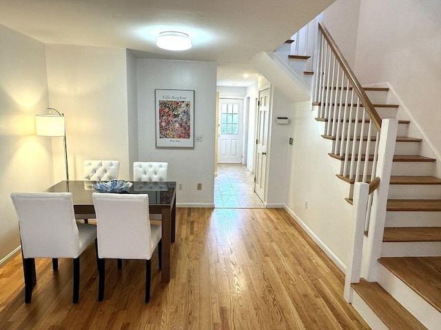 59-R Union St Unit 59-R, Boston, MA 02135 - dining area with wood finished floors, stairs, and baseboards