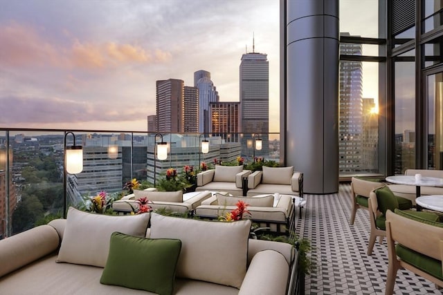 balcony at dusk with outdoor lounge area