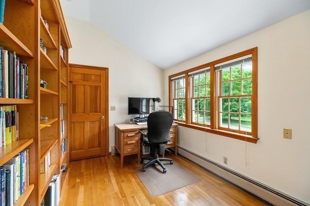 5 Whipple Rd, Hamilton, MA 01982 - home office with a baseboard heating unit, light wood-type flooring, and high vaulted ceiling