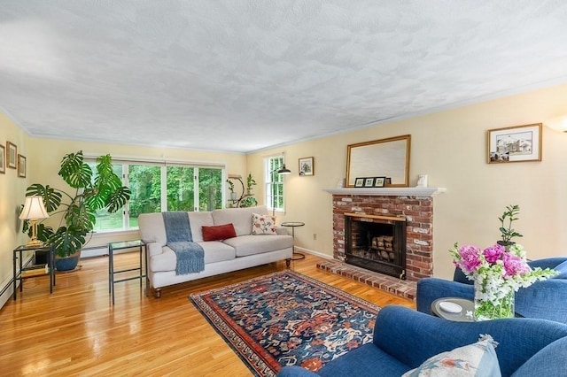 5 Whipple Rd, Hamilton, MA 01982 - living area featuring wood finished floors and a brick fireplace