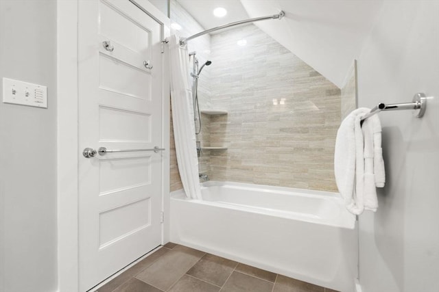 full bath with shower / bath combination with curtain and tile patterned floors