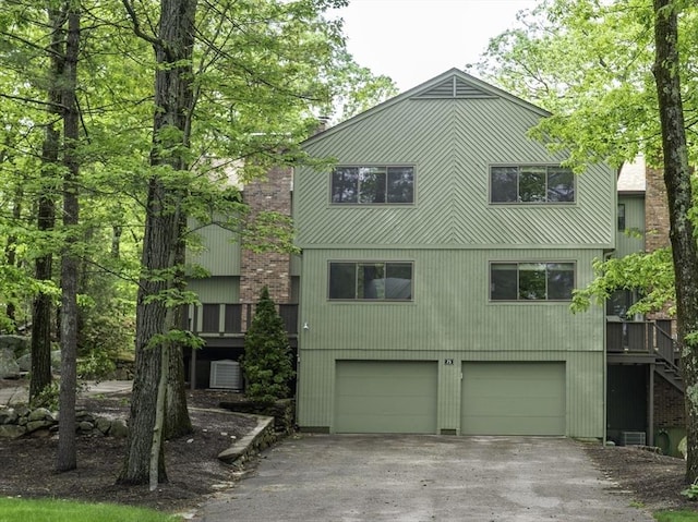 73 Mountain Gate Rd Unit 73, Ashland, MA 01721 - view of front of house with a garage and driveway