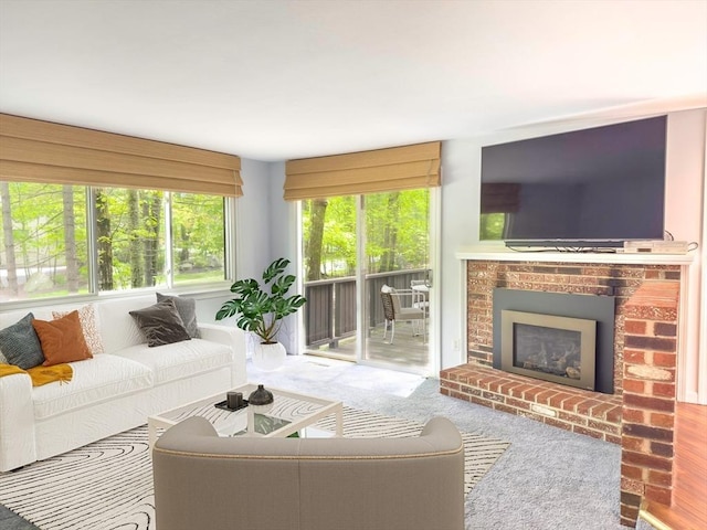 73 Mountain Gate Rd Unit 73, Ashland, MA 01721 - living room featuring a brick fireplace