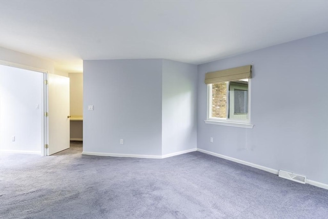 73 Mountain Gate Rd Unit 73, Ashland, MA 01721 - empty room with carpet floors and baseboards