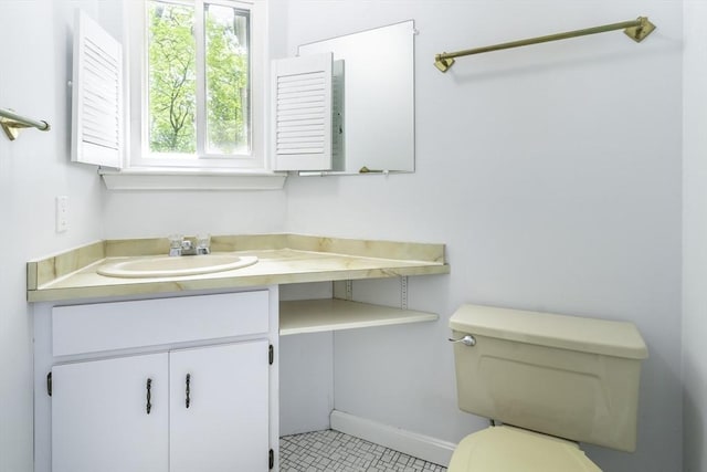 73 Mountain Gate Rd Unit 73, Ashland, MA 01721 - bathroom with vanity, toilet, tile patterned floors, and baseboards