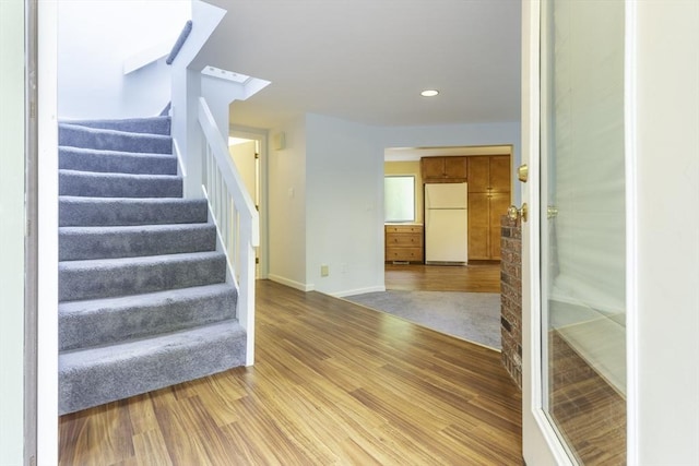 73 Mountain Gate Rd Unit 73, Ashland, MA 01721 - stairway featuring wood finished floors, recessed lighting, and baseboards